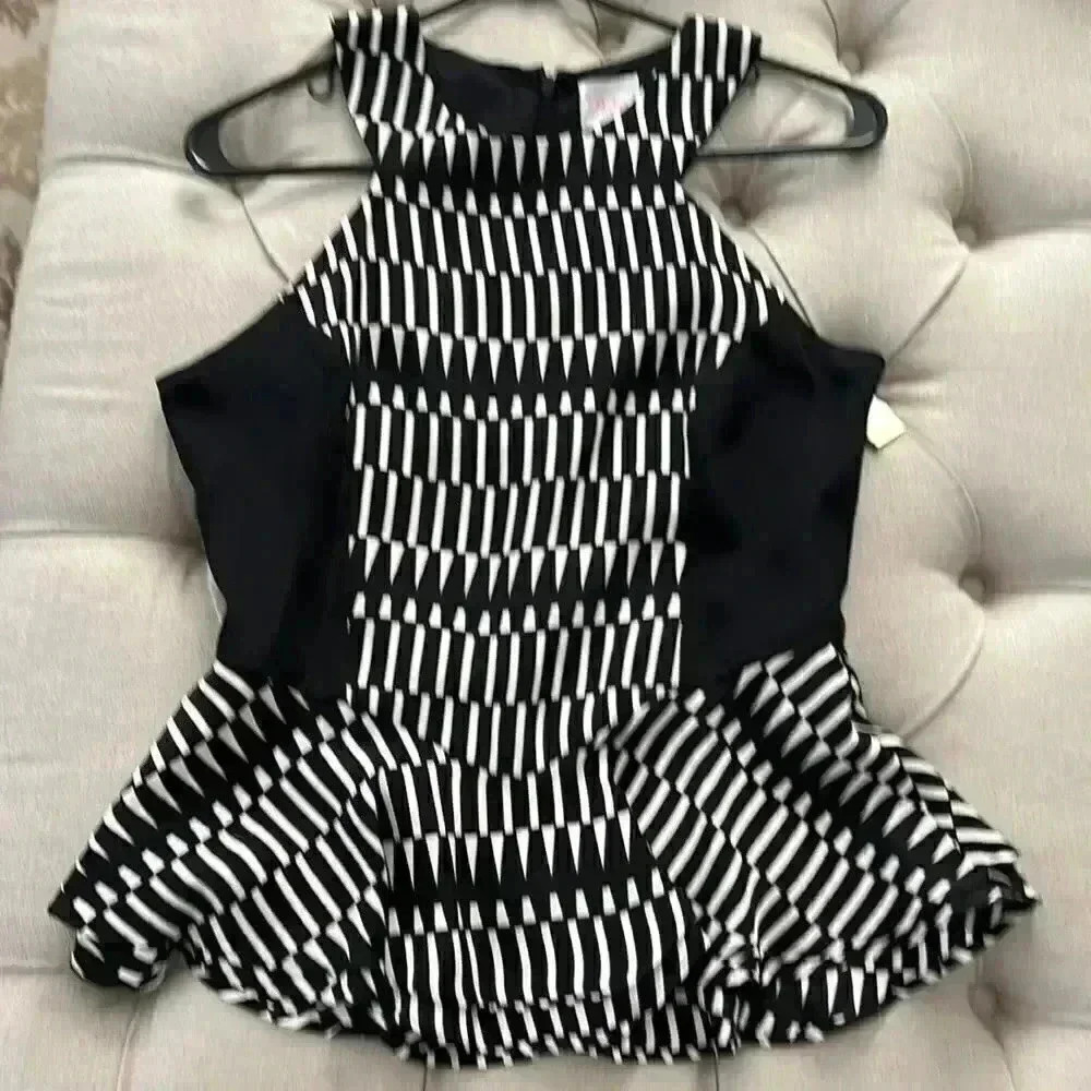 Parker medium zip up black and white peplum shirt